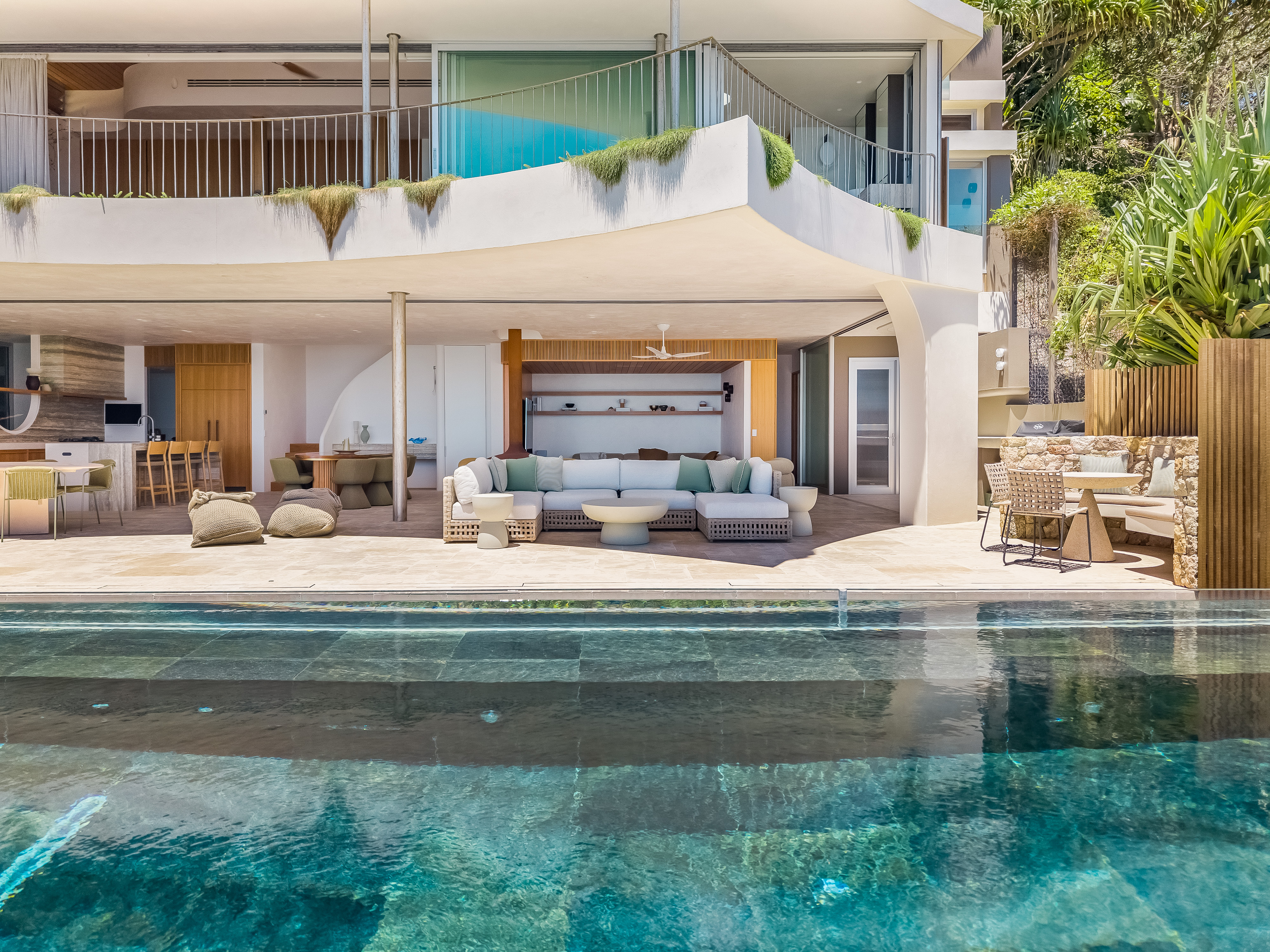 Poolside entertaining area — professional real estate photography by Media Drive