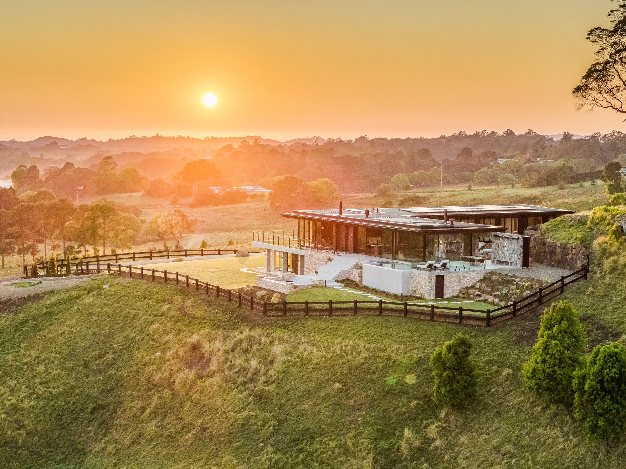 CODA at sunrise with morning haze across the hinterland