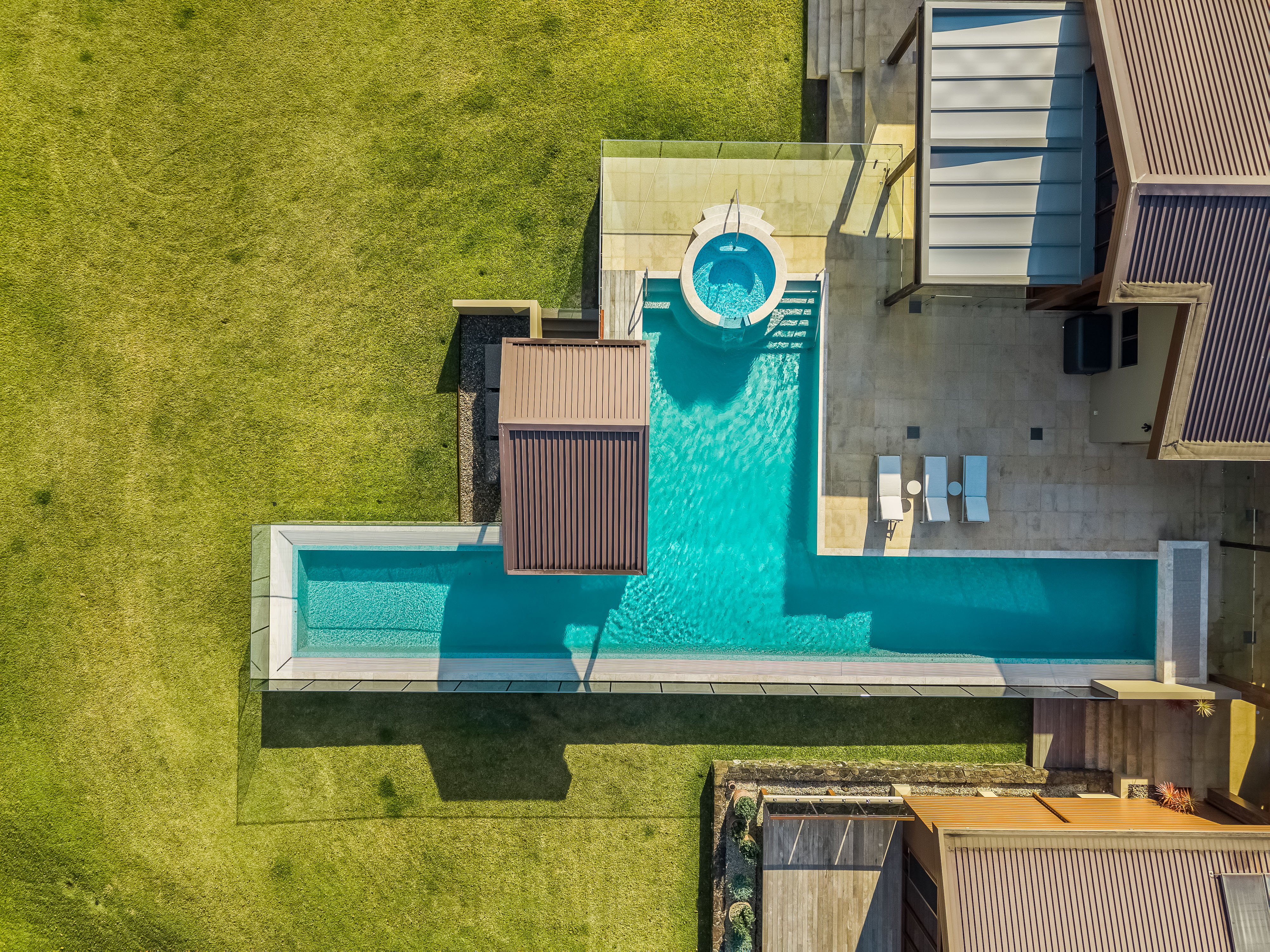 Overhead drone view of pool and spa — aerial real estate photography Bangalow