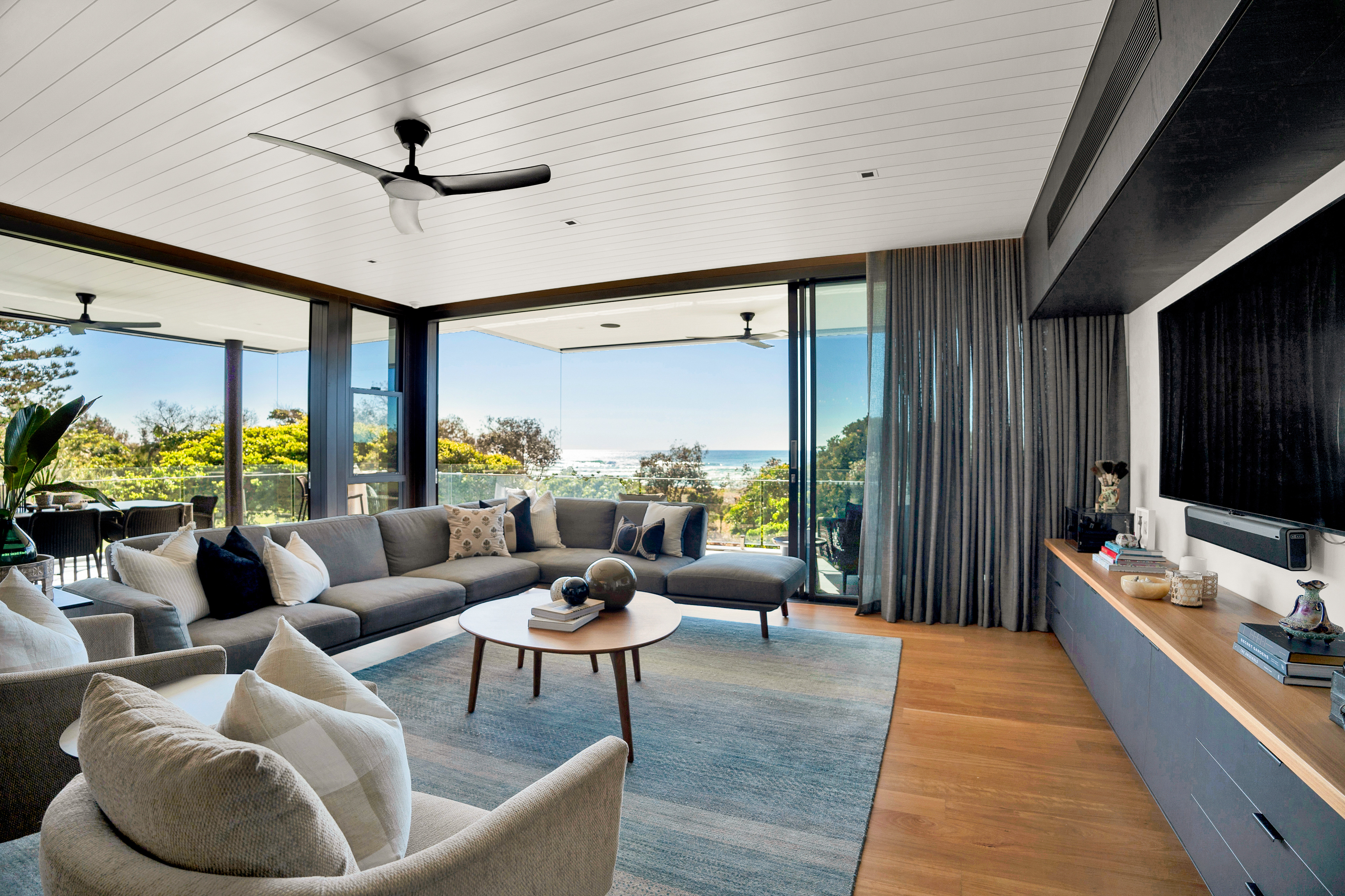 Living room with ocean views and balcony — professional property photographer Tweed Coast